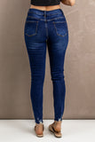 Distressed Button Fly Skinny Jeans